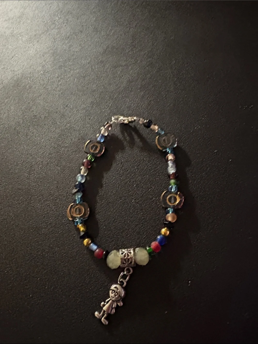 Multicolor Beaded Charm Bracelet with Silver Doll Pendant